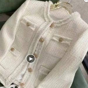 Sophisticated Gold and White Bouclé Blazer